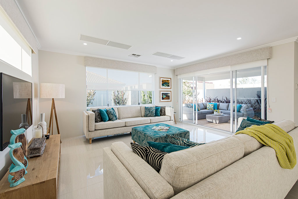 Ducted air conditioning through grilles in the ceiling.