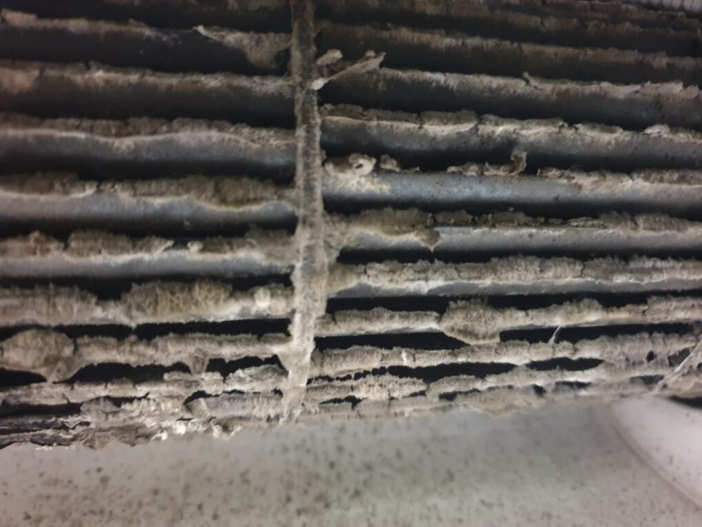 Dirty wall mounted air con filter